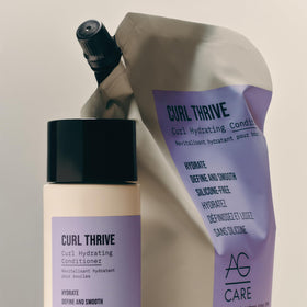 AG Care on bathroom shelf styled with towels, clean routine and eco-friendly benefit