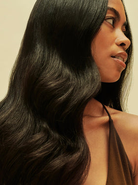 AG Care applied to hair ends to demonstrate smoothing effect and added shine