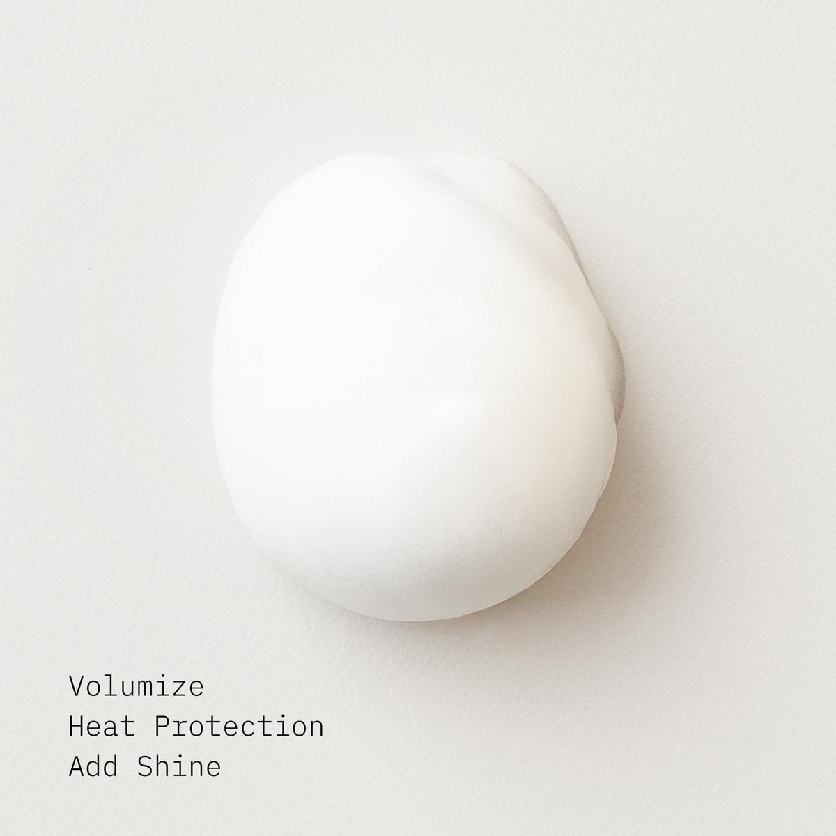 AG Care foam volumizer applied at roots demonstrating lift and fullness benefit