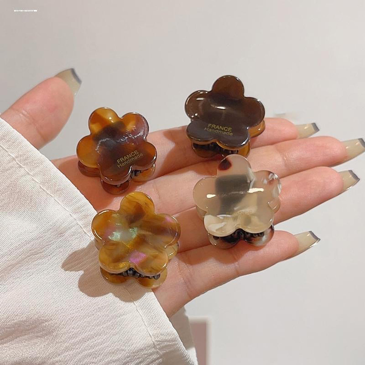 Agirlvct spread of neutral colors and floral patterns for mix-and-match looks