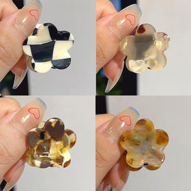 Agirlvct clips used as accents in a braid and bun, decorative versatility