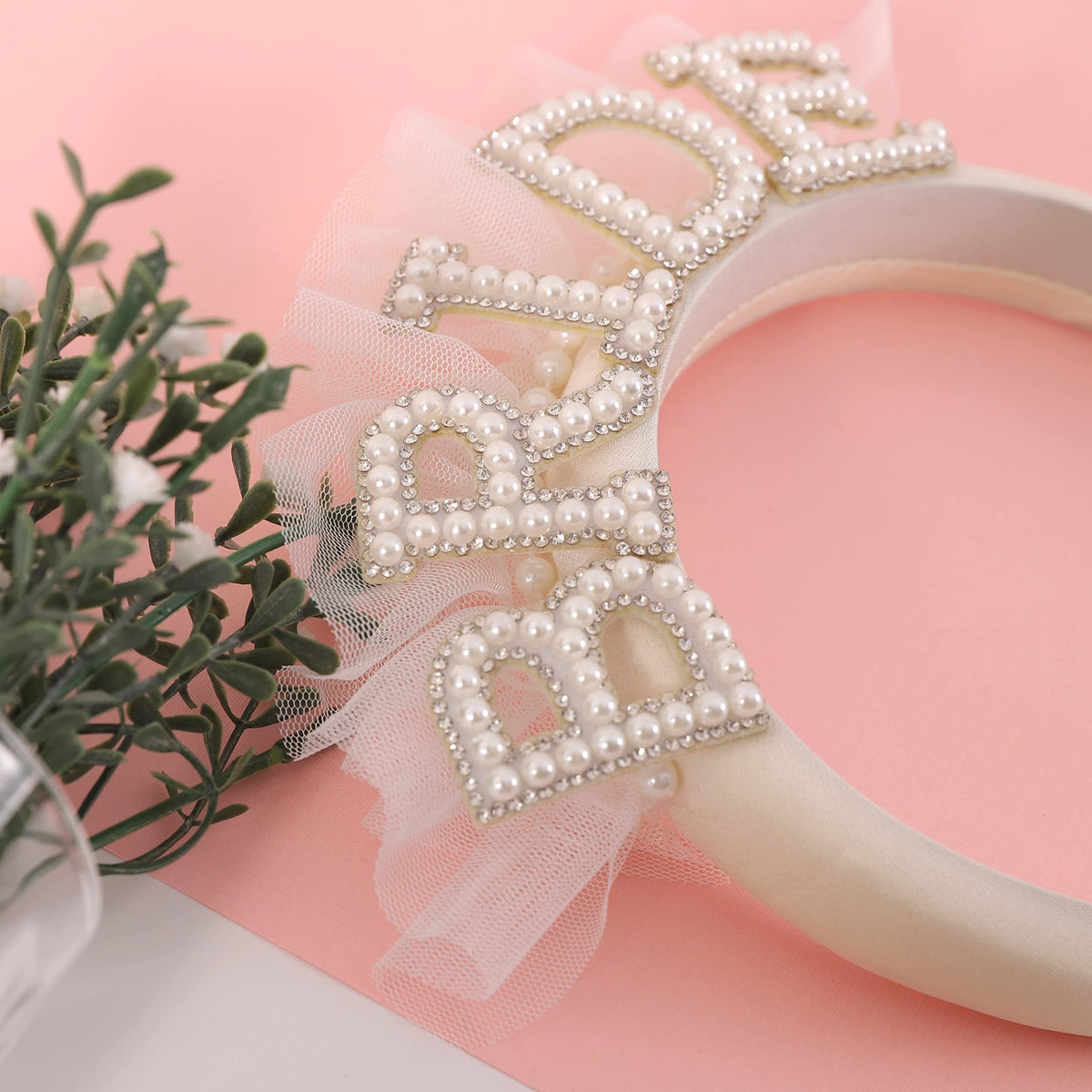Agkvw close-up of pearl and rhinestone decoration highlighting sparkle and handcrafted detail