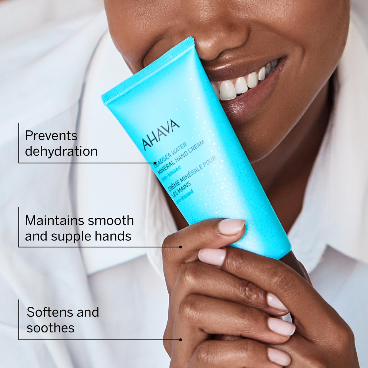 AHAVA cream being squeezed onto hand demonstrating easy application