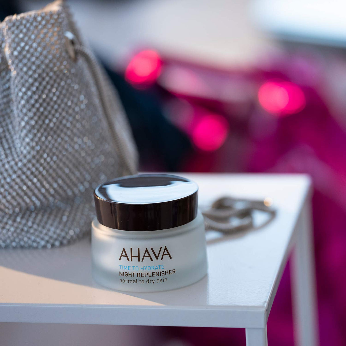 AHAVA applied on face at night demonstrating nourishing overnight hydration