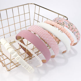 AHONEY model wearing a pink headband demonstrating secure non-slip hold