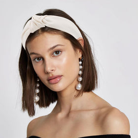 AHONEY headband on model showing scale and fit for different heads