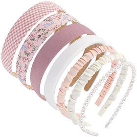 AHONEY hand holding a headband showing flexible size and travel-friendly design