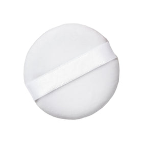 Airspun swatched on skin showing blurred pores and reduced shine benefit