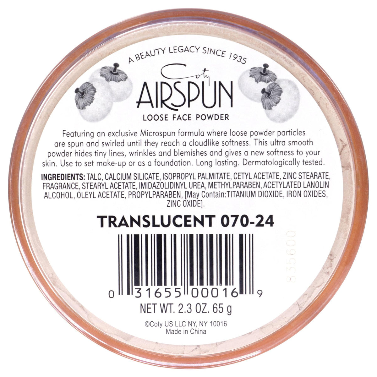 Airspun powder puff resting on lid demonstrating soft applicator for smooth finish