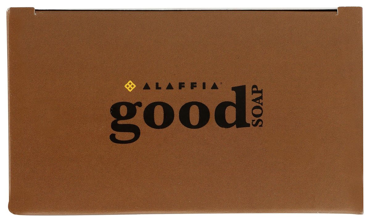 Hand using Alaffia coconut bar to wash, showing easy multipurpose use