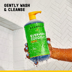 Alaffia creamy foam texture on hand illustrating gentle lather and rinseability