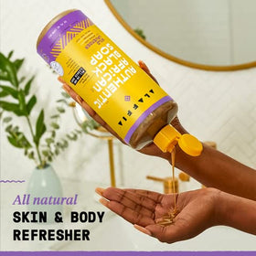 Alaffia pump dispensing soap into hand for easy use and quick application