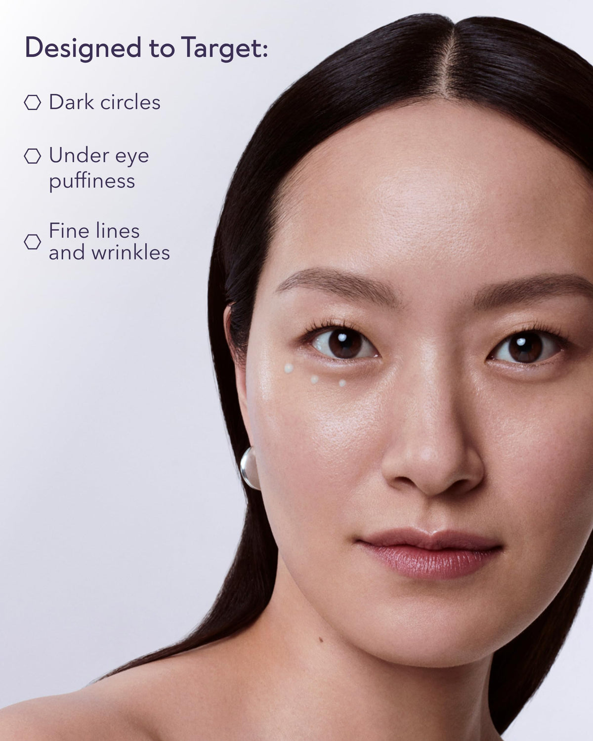 ALASTIN small dab on fingertip demonstrating easy application benefit