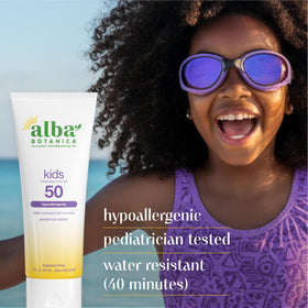 Alba Botanica 3 oz tube shown beside hand for compact travel scale