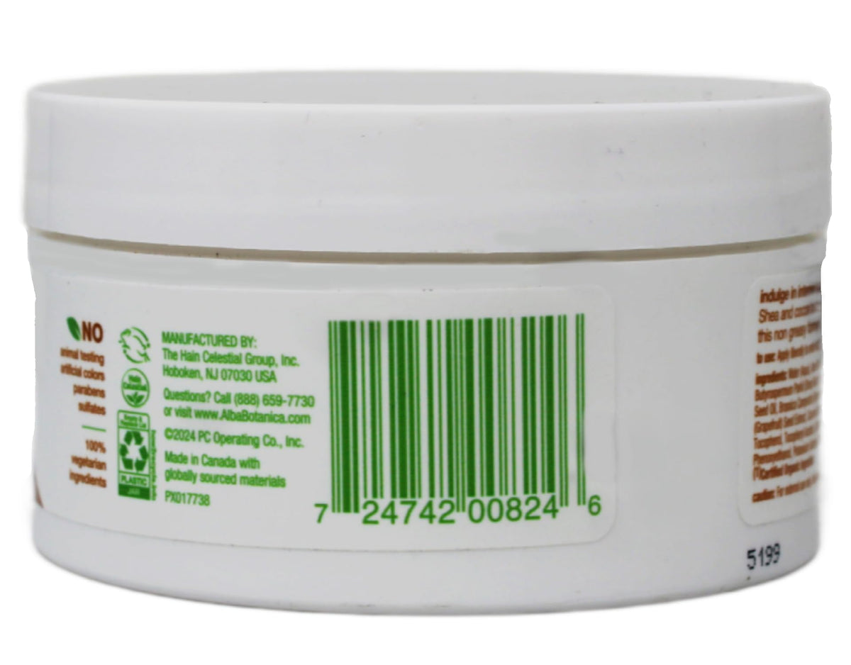 Dispensing Alba Botanica kukui nut cream from bottle to show cream consistency and controlled application