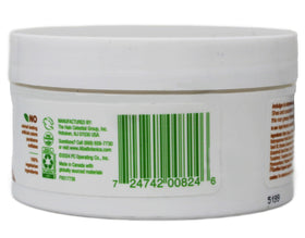 Dispensing Alba Botanica kukui nut cream from bottle to show cream consistency and controlled application