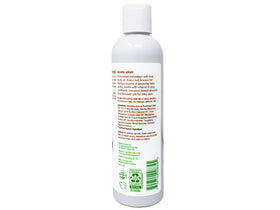 Alba Botanica pouring oil into palm for easy application
