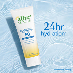 Alba Botanica size comparison next to hand for travel-friendly 3 fl oz