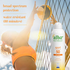 Alba Botanica bottle on beach towel in lifestyle scene showing water-resistant protection for outdoors