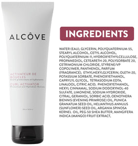 Alcôve bottle next to hand to show 8.5oz scale and convenient size