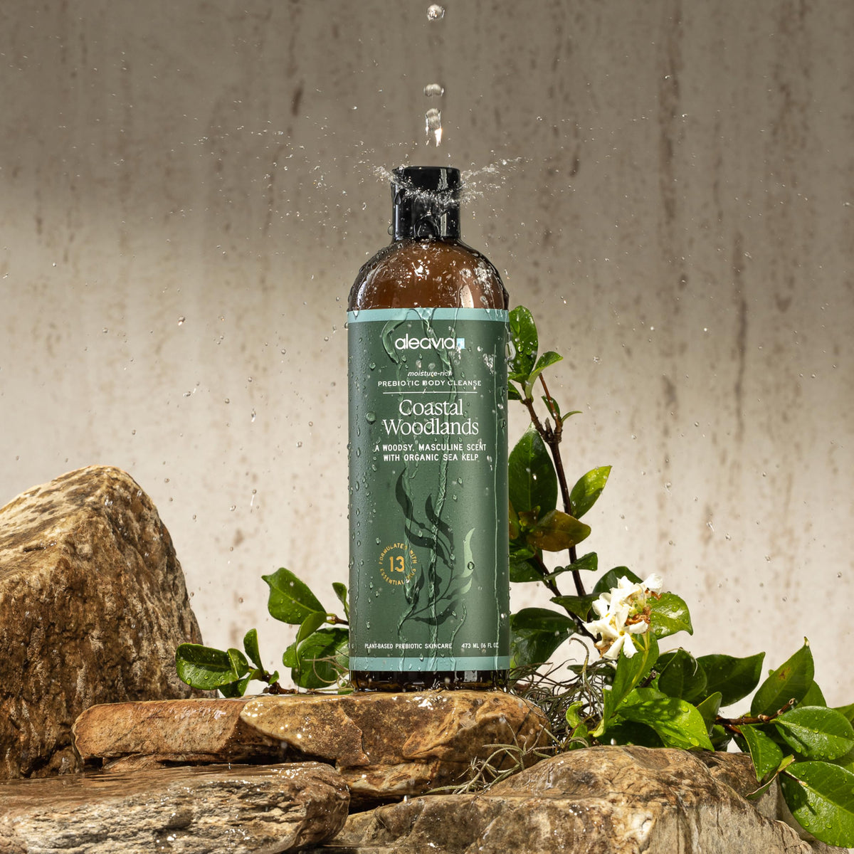 Aleavia bottle staged in modern bathroom showing lifestyle benefit: premium grooming aesthetic