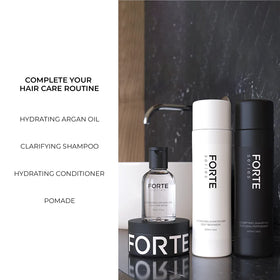 Alex Costa bottle staged in shower illustrating in-routine use and refreshing finish