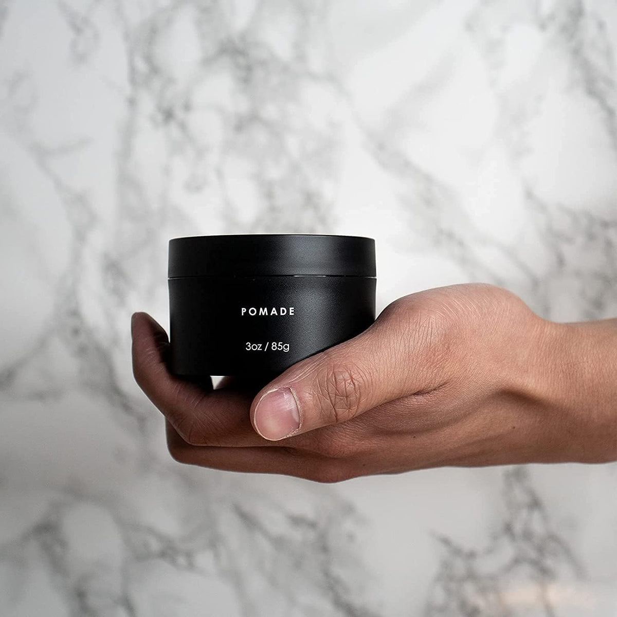 Alex Costa jar on bathroom vanity staged for daily grooming routine and lifestyle appeal