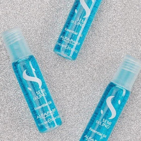ALFAPARF MILANO applying oil to damp hair to smooth cuticle and boost shine
