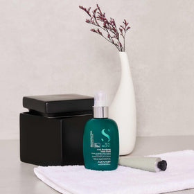 ALFAPARF MILANO texture droplet on hand showing lightweight formula