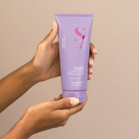 ALFAPARF MILANO conditioner being applied to hair for detangling benefit