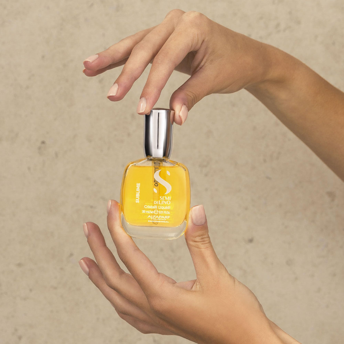 ALFAPARF MILANO travel-size bottle on counter for convenience benefit