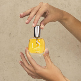ALFAPARF MILANO travel-size bottle on counter for convenience benefit