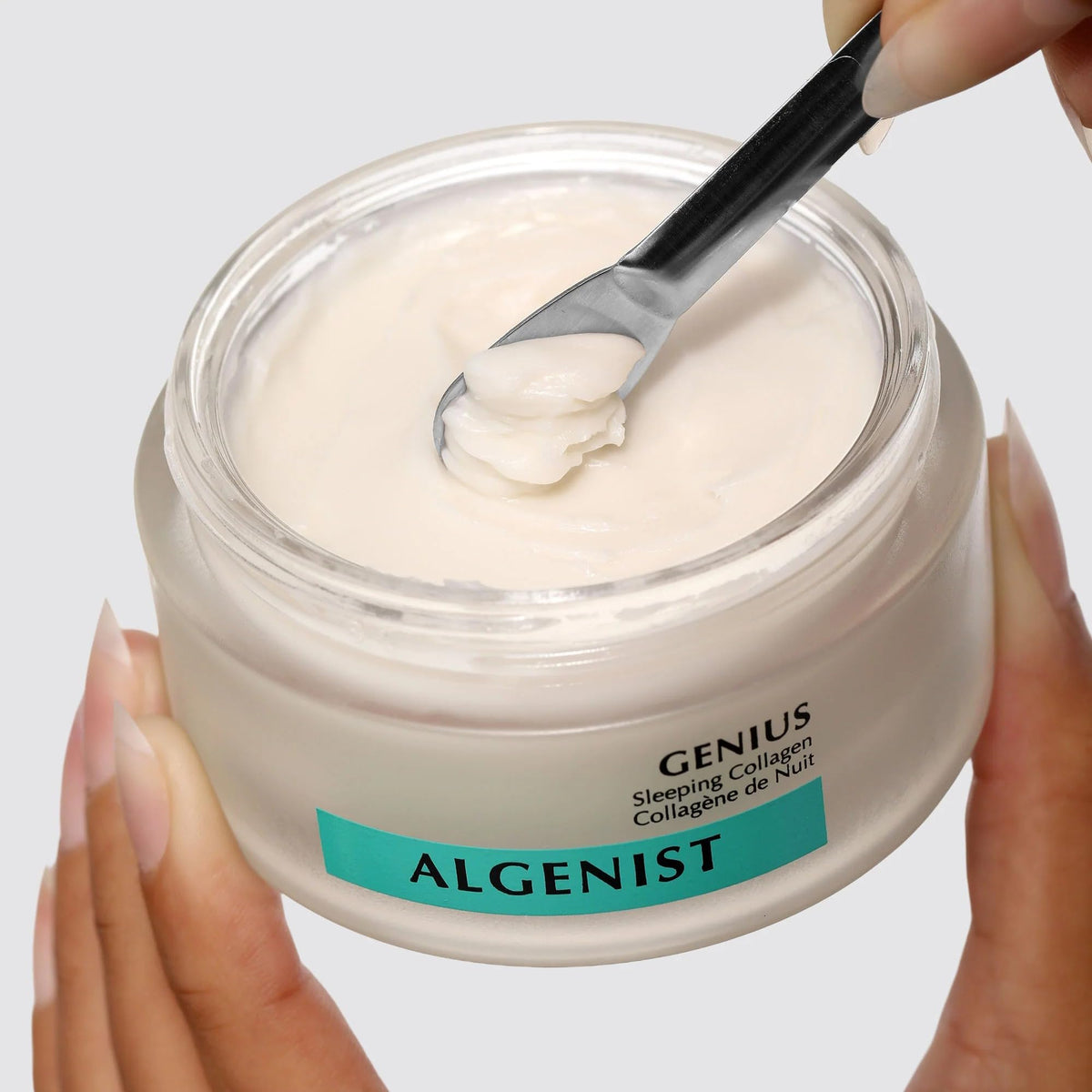 Algenist 2 oz jar beside coin for scale showing accurate sizing and travel convenience benefit