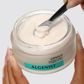 Algenist 2 oz jar beside coin for scale showing accurate sizing and travel convenience benefit