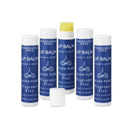 ALIDA PURE front packaging showing five unscented vegan lip balm tubes and eco box benefits