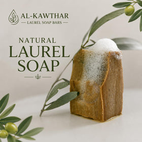 ALKAWTHAR bar beside olive and laurel leaves showing natural ingredients