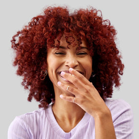 All About Curls pump producing airy foam texture for easy distribution