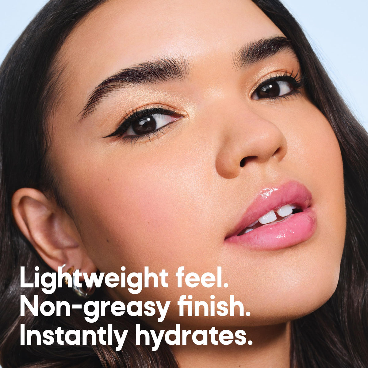 Almay application over makeup showing long-wear benefit
