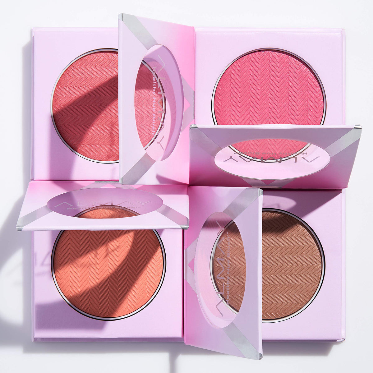 Almay blush inside purse in lifestyle setting for on-the-go touch-ups