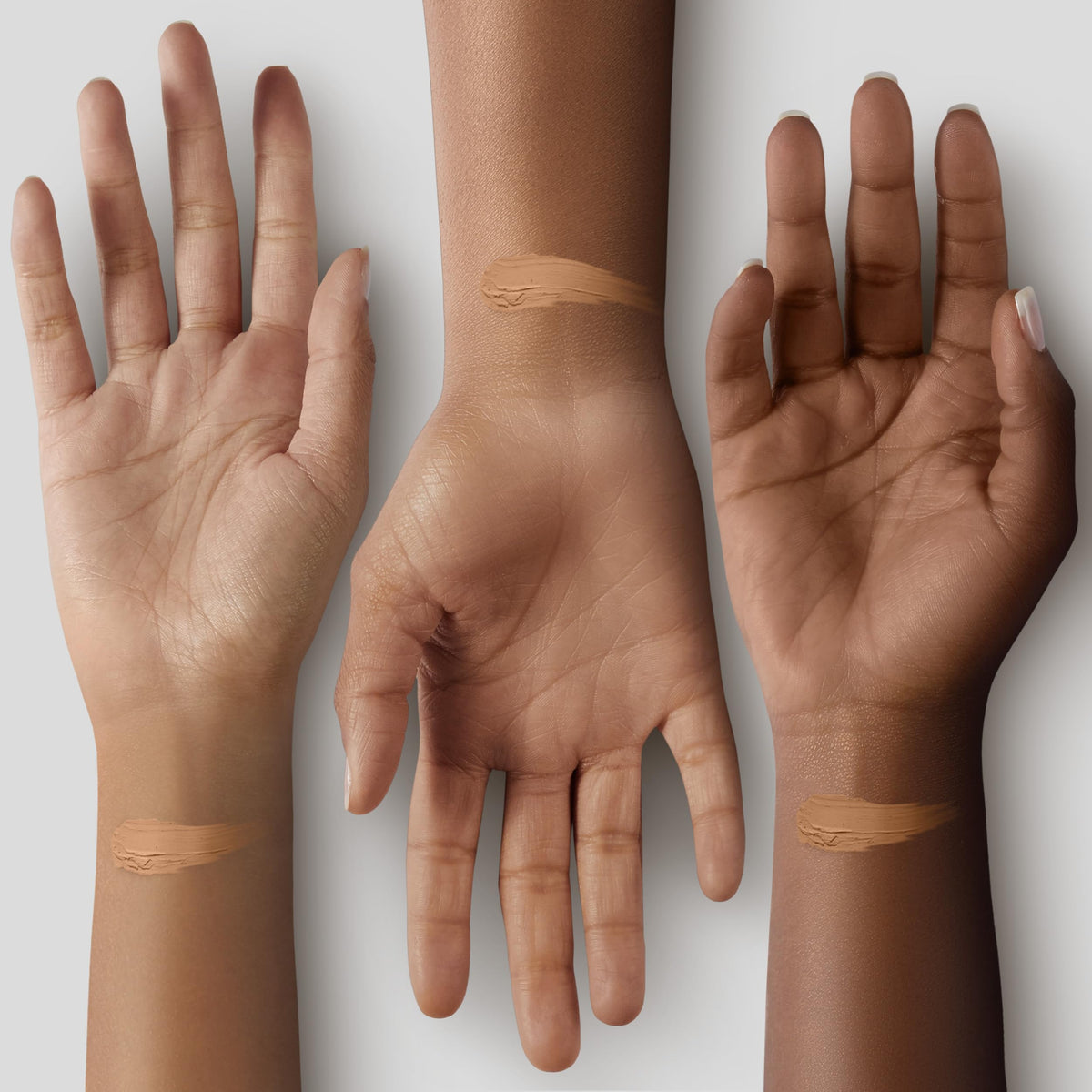 Almay doe-foot wand applying concealer to skin, precise spot treatment benefit
