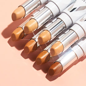 Almay concealer applied under eye demonstrating brightening effect