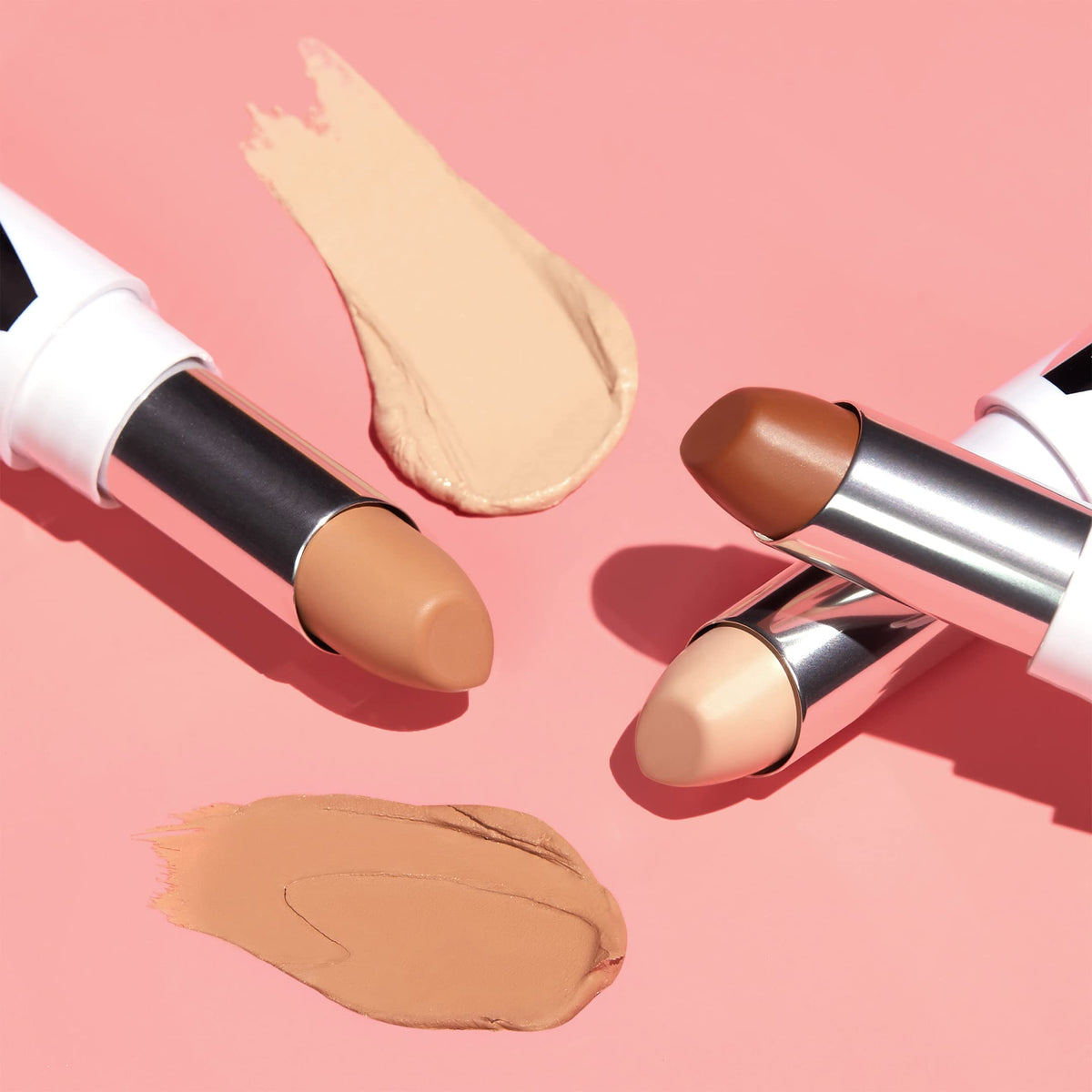 Almay concealer texture close-up swipe illustrating creamy blendability