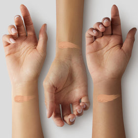 Almay foundation texture swatch on skin demonstrating blendable coverage