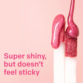 Almay gloss on model’s lips highlighting luminous, non-sticky finish