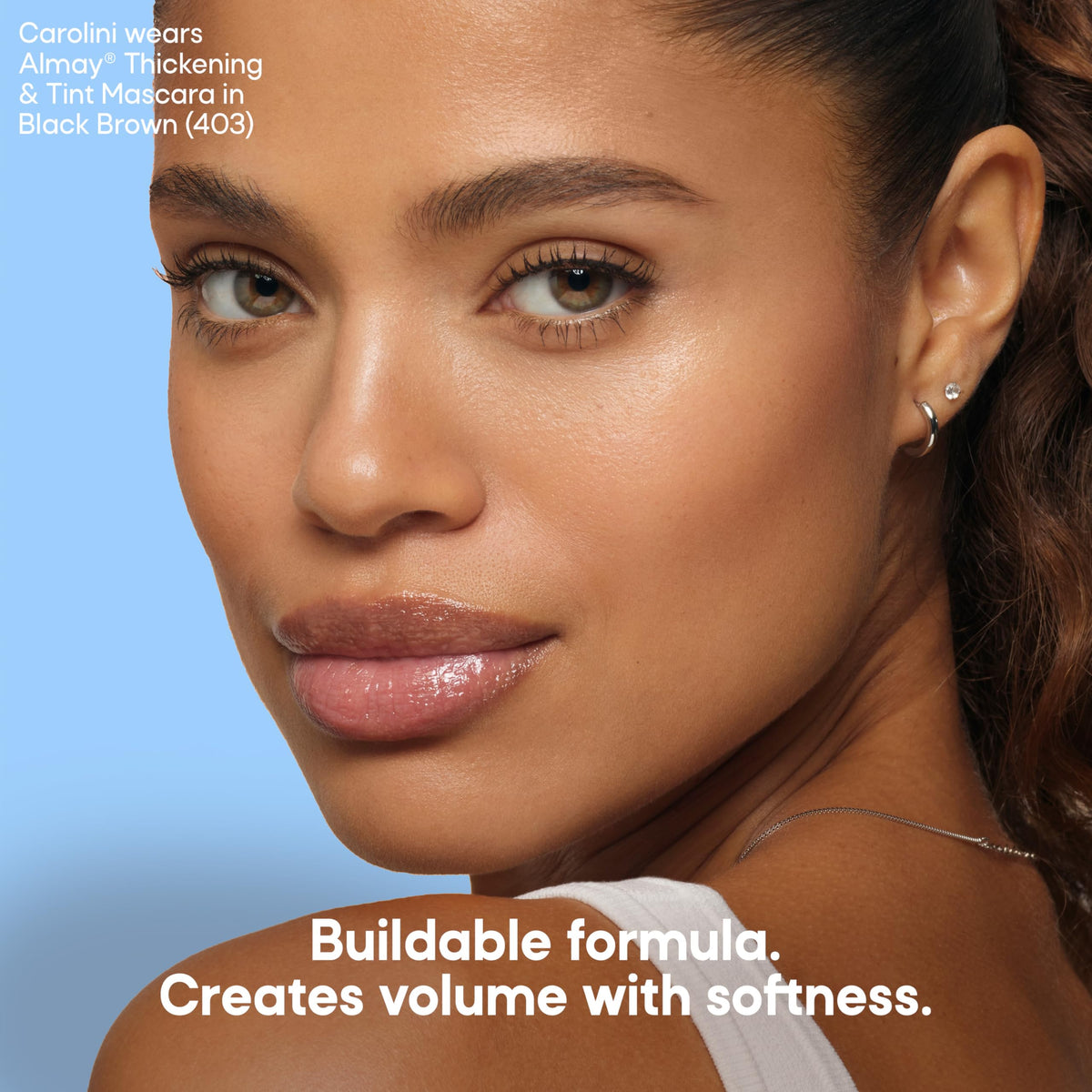 Almay open tube showing smooth formula texture and buildable pigment