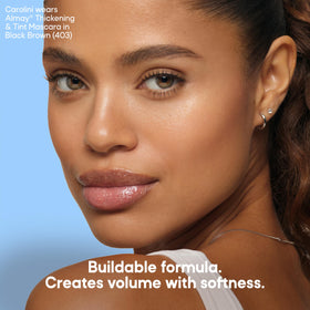 Almay open tube showing smooth formula texture and buildable pigment