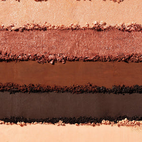 Almay primer base close-up showing texture and vitamin E benefit for longer wear