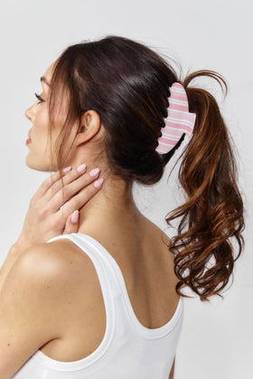 Almere hair claw clip holding a bun on a model, demonstrating no-slip grip and comfortable fit