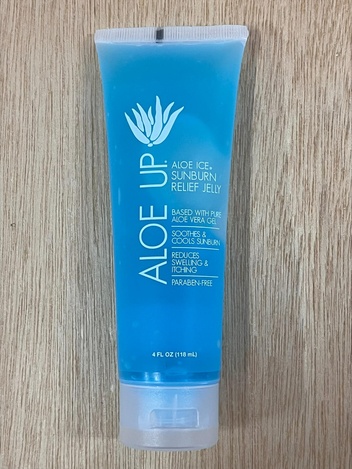 ALOE UP being applied to arm, brand calming redness and hydrating skin