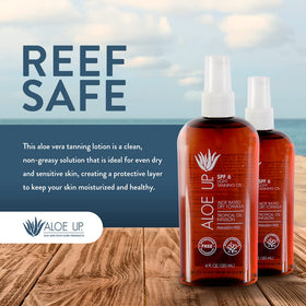 Aloe Up bottle in hand showing 4 oz travel-ready size